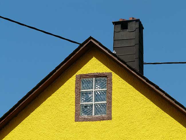 Abbildung Schornstein Holzherd auf Dach
